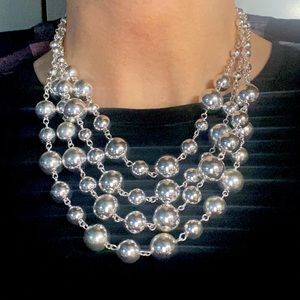 Four strand silver necklace